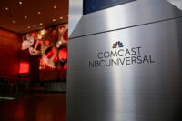 A view shows a signage of Comcast and NBC Universal in the lobby of the corporate headquarters of Comcast, which announced plans to spin-off the bulk of its fading NBCUniversal cable TV networks, including MSNBC and CNBC, in Philadelphia, Pennsylvania, U.S. November 20, 2024. REUTERS/Bastiaan Slabbers