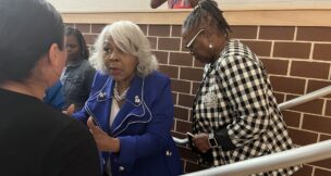 Virgnia Sen. Louise Lucas (left) speaks with an attendee of a Chesterfield County data center town hall she hosted June 16, 2026, with Sen. Mamie Locke (right). Photo by Kate Andrews/Virginia Business