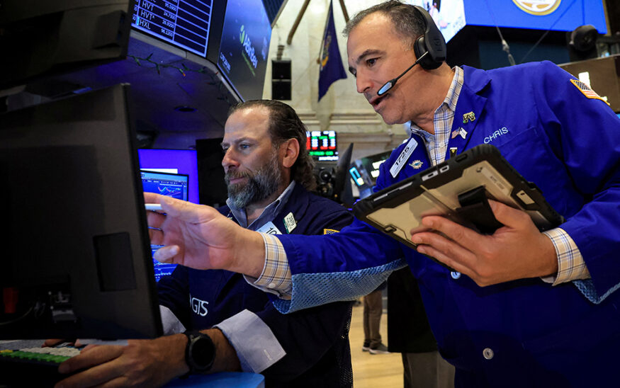 Traders work on the floor at the New York Stock Exchange (NYSE) in New York City, U.S., June 24, 2026. REUTERS/Brendan McDermid