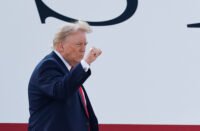 U.S. President Donald Trump gestures as he boards the new Air Force One, a plane gifted by the Qatari government, at Joint Base Andrews, Maryland, U.S., July 1, 2026. REUTERS/Kylie Cooper