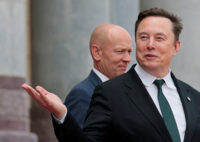 Elon Musk gestures as he leaves after attending a welcome ceremony for U.S. President Donald Trump with Chinese President Xi Jinping at the Great Hall of the People in Beijing, China, May 14, 2026. REUTERS/Evan Vucci/File Photo