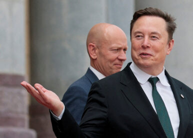 Elon Musk gestures as he leaves after attending a welcome ceremony for U.S. President Donald Trump with Chinese President Xi Jinping at the Great Hall of the People in Beijing, China, May 14, 2026. REUTERS/Evan Vucci/File Photo