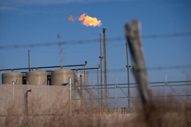 A flare burns off excess natural gas in the Permian Basin oil field near Odessa, Texas, U.S. February 18, 2025. REUTERS/Eli Hartman/File Photo
