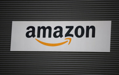 Amazon logo outside an Amazon warehouse in Manchester, Britain, October 28, 2025. REUTERS/Phil Noble/File Photo