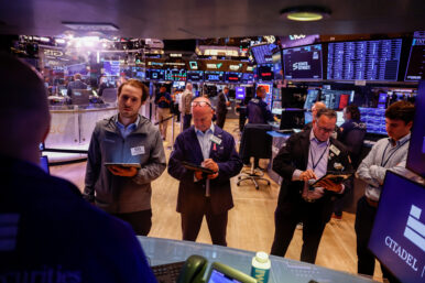 Traders work on the floor of the New York Stock Exchange (NYSE), in New York City