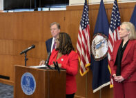 Sen. Lashrecse Aird, D-Henrico County, addresses a news conference June 16, 2026, on a compromise for the start of a retail cannabis market in Virginia. She is flanked by Del. Paul Krizek, D-Alexandria, left, and Gov. Abigail Spanberger.