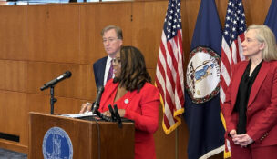 Sen. Lashrecse Aird, D-Henrico County, addresses a news conference June 16, 2026, on a compromise for the start of a retail cannabis market in Virginia. She is flanked by Del. Paul Krizek, D-Alexandria, left, and Gov. Abigail Spanberger.