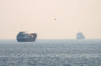 FILE PHOTO: Vessels at the Strait of Hormuz, as seen from Musandam