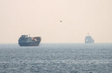 FILE PHOTO: Vessels at the Strait of Hormuz, as seen from Musandam