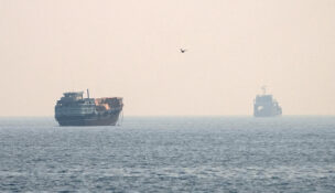 FILE PHOTO: Vessels at the Strait of Hormuz, as seen from Musandam