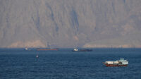FILE PHOTO: Tankers and other vessels in the Strait of Hormuz off the coast of Musandam