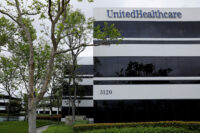 The corporate logo of UnitedHealthcare, the insurance unit of UnitedHealth Group, appears on the side of one of their office buildings, in Santa Ana