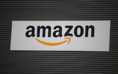 FILE PHOTO: Amazon logo outside an Amazon warehouse in Manchester