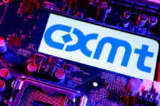 FILE PHOTO: Illustration shows CXMT logo and computer motherboard