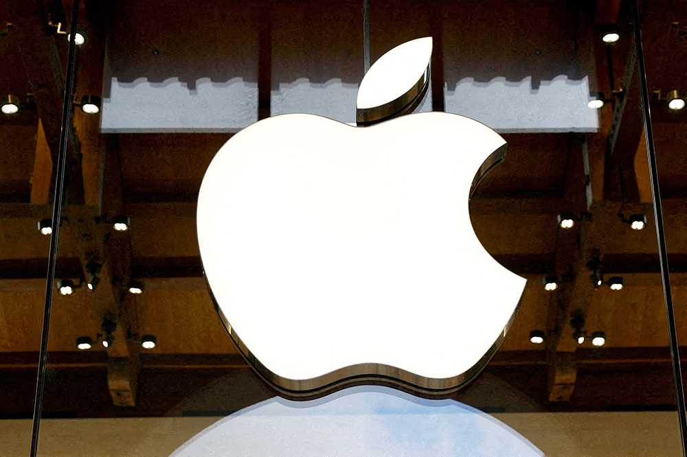 Apple briefly tops $5 trillion market value for first time
