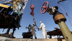 Specialists work at a drilling rig at the Airankol oil field operated by Caspiy Neft in the Atyrau region, Kazakhstan, April 20, 2026. REUTERS/Pavel Mikheyev