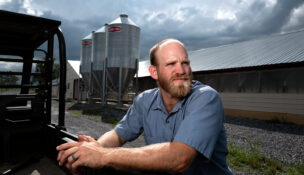 Josh Eberly is a third-generation farmer at his Rockingham County poultry farm and a member of the Virginia Poultry Growers Cooperative. Photo by Norm Shafer