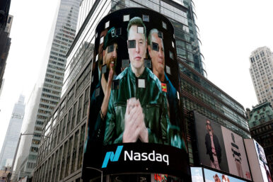 A live feed shows SpaceX CEO Elon Musk on the day of SpaceX's initial public offering (IPO) at the Nasdaq MarketSite, in New York City, U.S., June 12, 2026. REUTERS/Jeenah Moon/File Photo