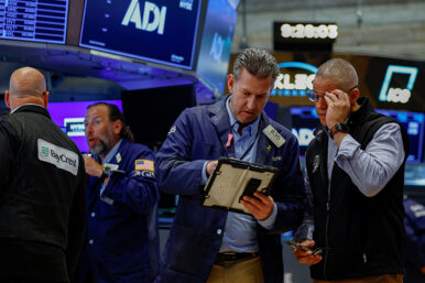 Traders work on the floor of the New York Stock Exchange (NYSE) in New York City