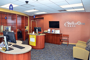 StellarOne’s branch at Patterson and Libbie avenues in Richmond looks more like a small hotel lobby than a banking office.