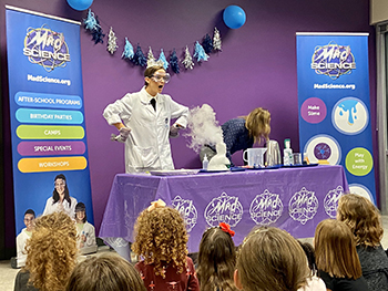 In January, Schrier visited Mad Science of Central Virginia in Henrico County, demonstrating science experiments for a class of delighted young girls. Photo by Sydney Lake