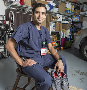 Dr. Vikas Pathak with Riverside Health had to sleep in a separate room from his wife and couldn’t hug his children as precautions against transmitting the coronavirus to his family. Photo by Mark Rhodes