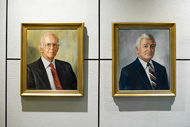 Paintings of Hirschler co-founders Edward S. Hirschler (left) and Alan Fleischer (right) are located prominently in Hirschler’s conference center.