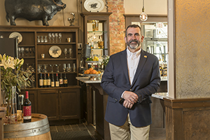 Chris Savvides, owner of Black Angus Restaurant in Virginia Beach, says his restaurant is prepared for the $9.50 raise, but if the state hikes wages to $15 an hour, it would hurt his business. Photo by Mark Rhodes