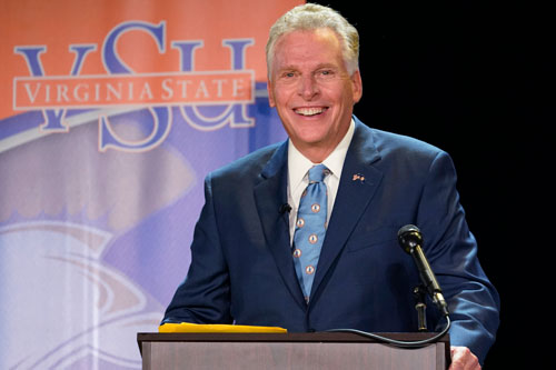 Former Gov. Terry McAuliffe touts his economic development successes and support for abortion rights and gun control. Photos by AP Photo/Steve Helber