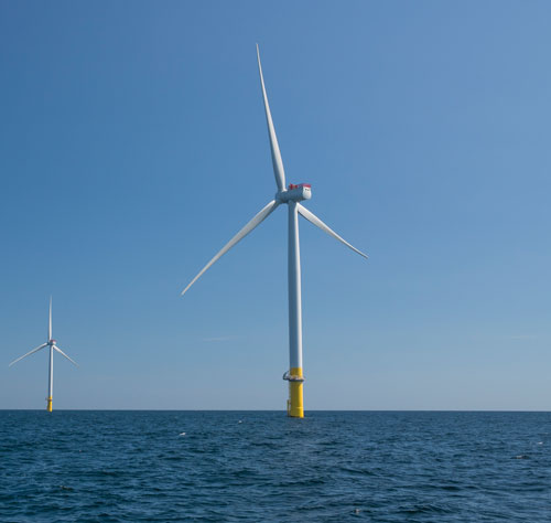 Dominion has erected two pilot wind turbines as part of its plan to build the nation's largest offshore wind farm 27 miles off the Virginia Beach coast. Photo by Mark Rhodes