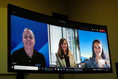 (L to R) Hantzmon Wiebel LLP employees Edward J. Schmitz, Jennifer S. Lehman, Leslie Lloyd and Rebecca Burtram participate in a video meeting in Charlottesville. Photo by Norm Shafer