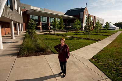 Pandemic infrastructure expenses such as installing Plexiglass barriers are “the price of doing business,” says Ginny Colwell, head of school for St. Paul VI Catholic High School in Chantilly. Photo by Will Schermerhorn