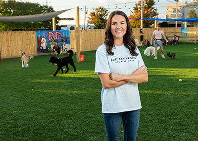 In October, Natalie opened Ruff Canine Club, a grassy dog park bar, in the Scott's Addition area, fulfilling a local demand for green space. Photo by Caroline Martin