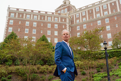 As a young man, Thompson worked as a night watchman and mowed the lawn at the Cavalier Hotel. Following a five-year, $85 million renovation completed in 2018, the hotel is now the centerpiece of his Cavalier Resort development. Photo by James Lee