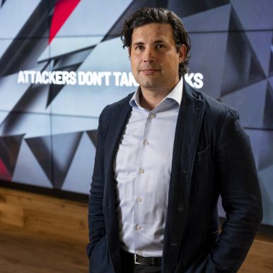 Cyberthreats “are not going away,” says Luke McNamara with Reston-based cybersecurity firm Mandiant. Several industries are at higher risk, he says, including energy, financial services, media and transportation. Photo by Will Schermerhorn