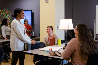 Foreground, L to R: Yasmine Rodriguez, a Reddix Center graduate assistant, talks with Valley Scholars students Destiny Campbell and Tessa Souder. Photo courtesy James Madison University