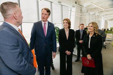 L to R: Mike Haynie, executive director of the IVMF and Syracuse University’s vice chancellor for strategic initiatives and innovation; Virginia Gov. Glenn Youngkin; Ruth Porat, Google and Alphabet’s president, chief investment officer and chief financial officer; and Virginia Secretary of Commerce and Trade Caren Merrick chat in Google's Reston office. Photo courtesy Google